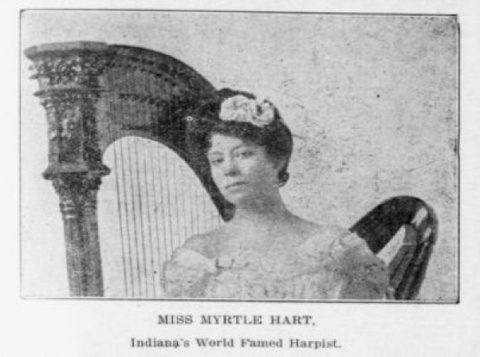 Image of Myrtle Hart and her harp from a newspaper